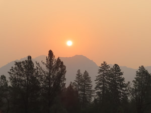 The smoke filed morning sky near lake Shasta.