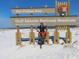 Ted on his rental bike at the National Park sign on the way to Fort Pickens, Florida.