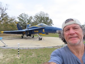 Ted with Blue Angles plane behind him at Pensacola Naval Museum in Florida.