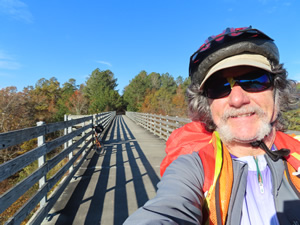 Ted with his bike on the Silver Comet Trail. - Pumpkinvine Creek Trestle