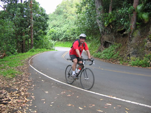 Ted on his rental bike cycling the Hana Highway.