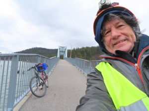Ted and his bike on Trail of the Coeur d’Alene Bridge on Lake Chatcolet.