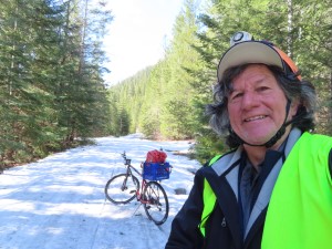 Ted and his bike with snow cover Trail of Coeur d’Alene, not far from Mullan, Idaho.