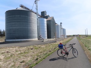 Ted’s bike in Cornwall, Idaho with grain silos near Butte Road.