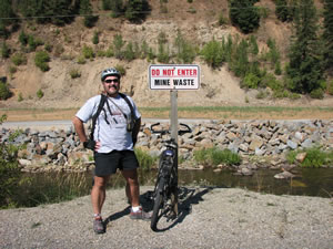 Jay (Ted’s brother) with his bike standing next to the trail of Coeur d’Alene.