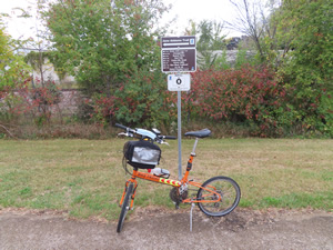Ted’s bike at mile 0 of the Jane Addams trail in Freeport, Illinois at Tutty’s crossing.
