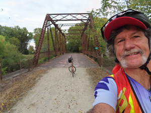 Ted with his bike on the Hennepin Canal parkway trail in Illinois.