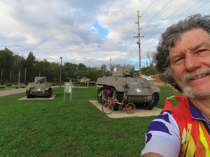 Ted, his bike and tanks at the Veterans Memorial park in Richmond, Indiana.
