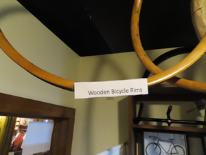 Part of the display of the Wright Brothers bike shop in the Museum at the birthplace of Wilbur Wright. – Wooden bike rims.