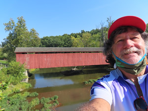 Ted with covered bridge behind him, near Upper Cataract Falls west of Indianapolis, Indiana.