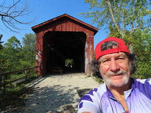 Ted with covered bridge behind him, near Upper Cataract Falls west of Indianapolis, Indiana.