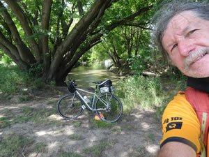 Ted with his bike near bike trail in Le Mars, Iowa.