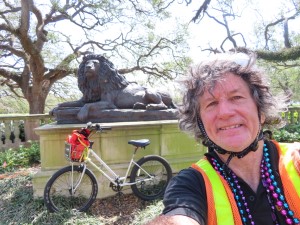 Ted with his rental bike near Lion Sculpture at the entrance to Audubon Park Zoo in New Orleans.
