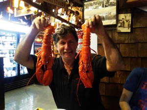 Ted holding up his Lobster dinner at Numam's Lobster house in Cape Porpoise, Maine.