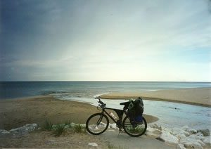 Ted bike loaded with Camping gear near Lake Michigan (Ted believes this is at Duck Lake State Park)