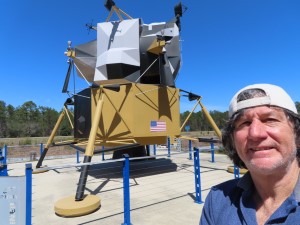Ted with Apollo Lunar Module behind him at NASA Stennis Visitor Center in Mississippi.