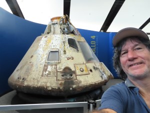 Ted with space capsule behind him at NASA Stennis Visitor Center in Mississippi.