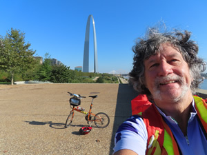 Ted and his bike with the Gateway Arch behind him in St. Louis, Missouri.