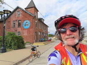 Ted and his bike in front of the Frisco Train Store near the Meramec Greenway bike trail.
