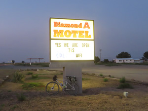 McDermitt, Nevada – Ted’s bike near sign as he is leaving his motel at 6:00 AM.