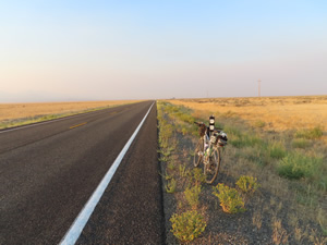 Ted’s bike on long straight highway 95 between McDermitt and Winnemucca, Nevada.