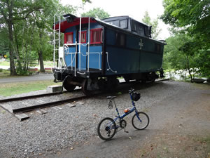 Caboose at North end of the Windham rails to trails in New Hampshire.