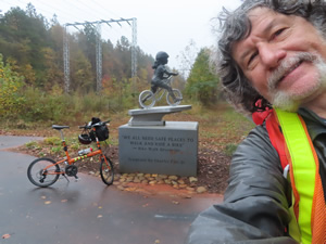 Ted with his bike on the Swamp Rabbit Trail.