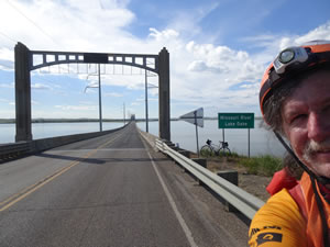 Ted with his bike at bridge over Missouri River at Mobridge, South Dakota.