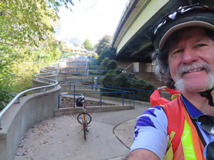 A portion of the Chattanooga riverwalk with a zigzag wheel chair accessible hill trail.