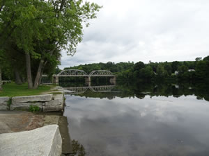 The bridge that crosses the Connecticut River near Charleston, New Hampshire taken from the Vermont side of the river.