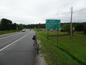 Ted bike at sign to Woodstock, Vermont. This was the western most point Ted cycled to in Vermont, then he headed back towards New Hampshire. 
