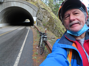 Ted with his bike after he went thorough tunnel descending from Hurricane Ridge.