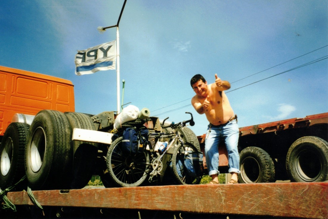 The friend of the trucker and Ted's bike on the truck that took Ted to Esquel.