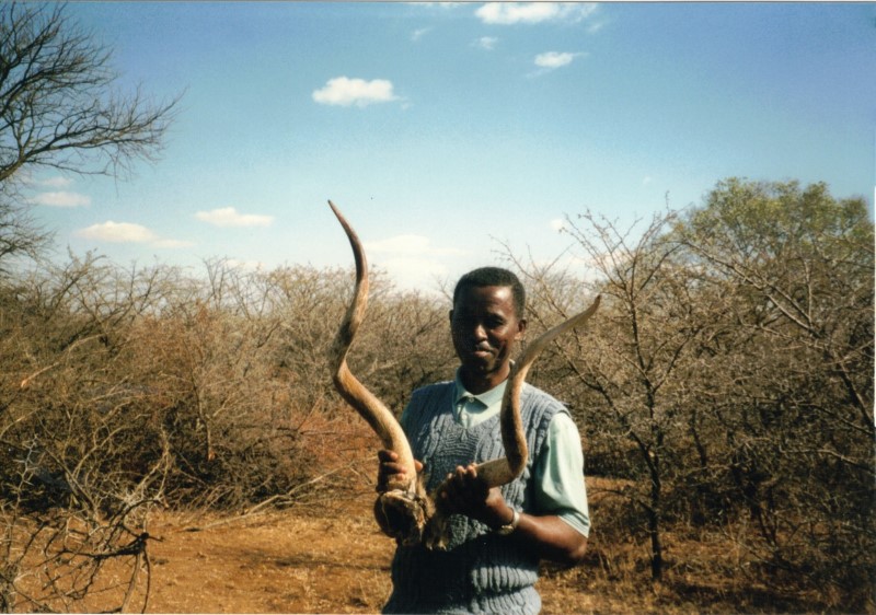 Our truck guide at the Hlekweni training center holding some kudu horns.