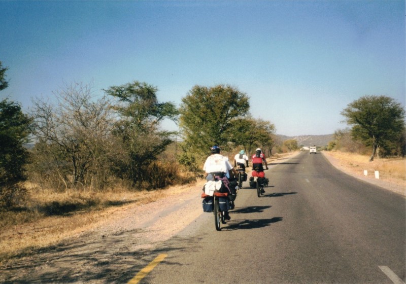 Our group biking from Victoria Falls to Hwange.  Rear to front - Gary, Becky, Ezra and Shingi.