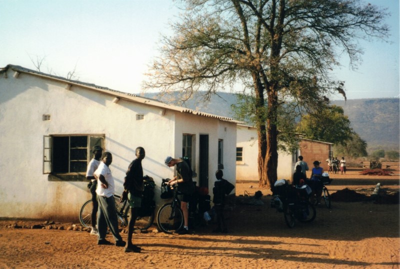 The building we stayed in next to the school in Sianzyundu.  Shingi and Ezra are next to their bikes.