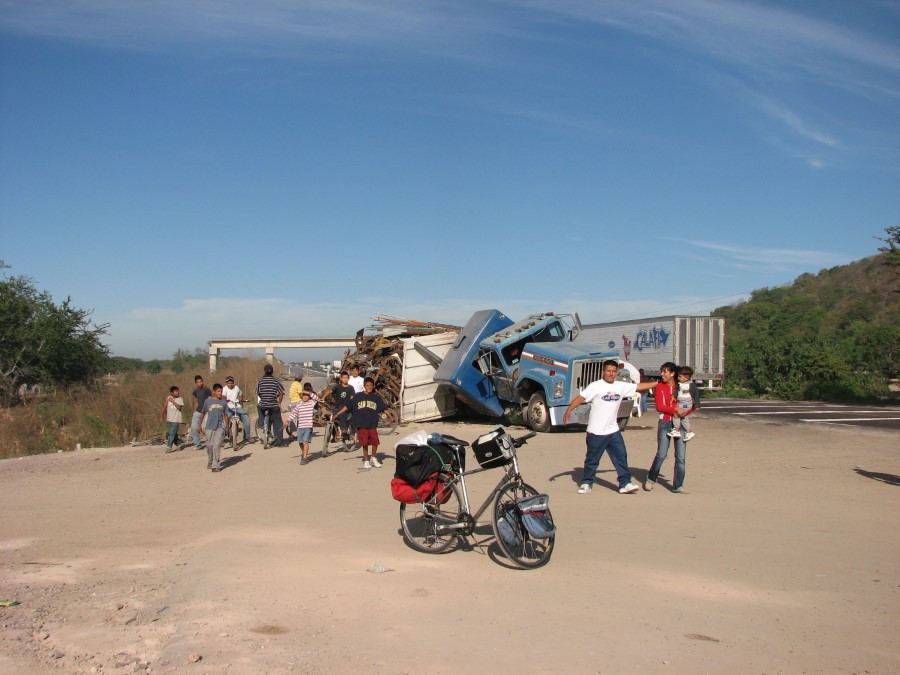 Ted's bike next to turned over diesel truck near Mexico Interstate 15 D. 