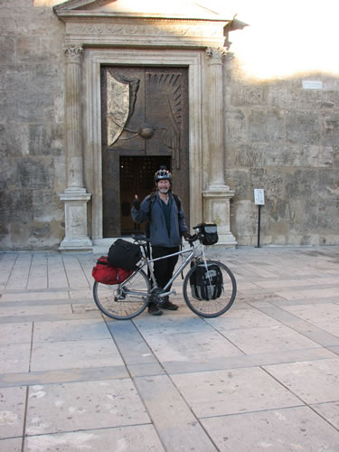Ted with his bike in front of Church in Alcamo