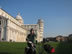 Ted with his bike in front of the leaning tower of Pisa, Italy