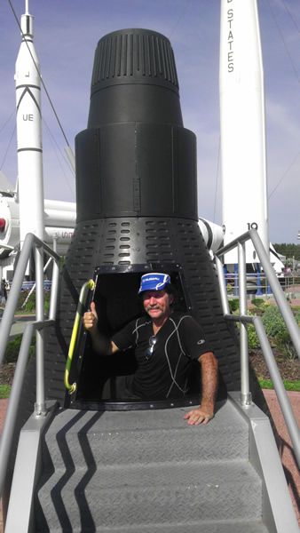 Ted in capsule at Kennedy Space Center, Florida