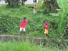 Kids near where Ted took off his rain gear in Malaysia