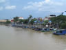 Boats in river near town of Muar, Malaysia