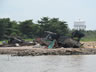 Fishing boat pile south of Batu Pahat, Malaysia, might be from 2006 Tsunami