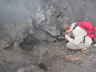 Man cooking Marshmallow over heat vent on Volcano Pacaya