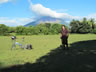 Ted and his bike with Volcano Concepcion in background in Nicaragua.