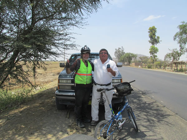 A man with Ted next to highway between Chiclayo, Peru and Pacasmayo, Peru. His daughter took this photo.