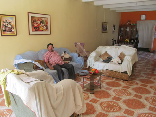 Inside the house of the friendly man that invited Ted over to his place between Chiclayo, Peru and Pacasmayo, Peru.