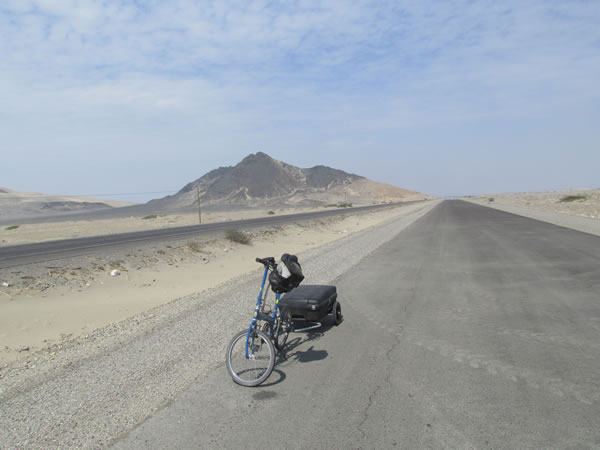 The new highway between Pacasmayo, Peru and Trujillo, Peru.  This was a great road to cycle, it was not an open part of the highway yet.  The road on the other side of the ditch has a lot of 2 way traffic.