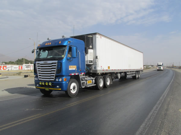 A Freightliner Argosy truck on the highway between Pacasmayo, Peru and Trujillo, Peru.