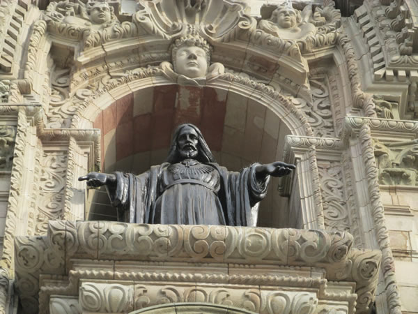 Statue on front of church in historic center of Lima, Peru.